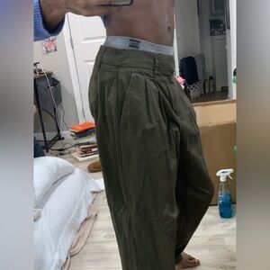 A. New Day Olive green trousers